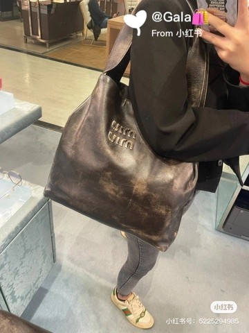 미우미우 5BC119_2F6P_F0V6L_V_OLM 가죽 호보백 M1